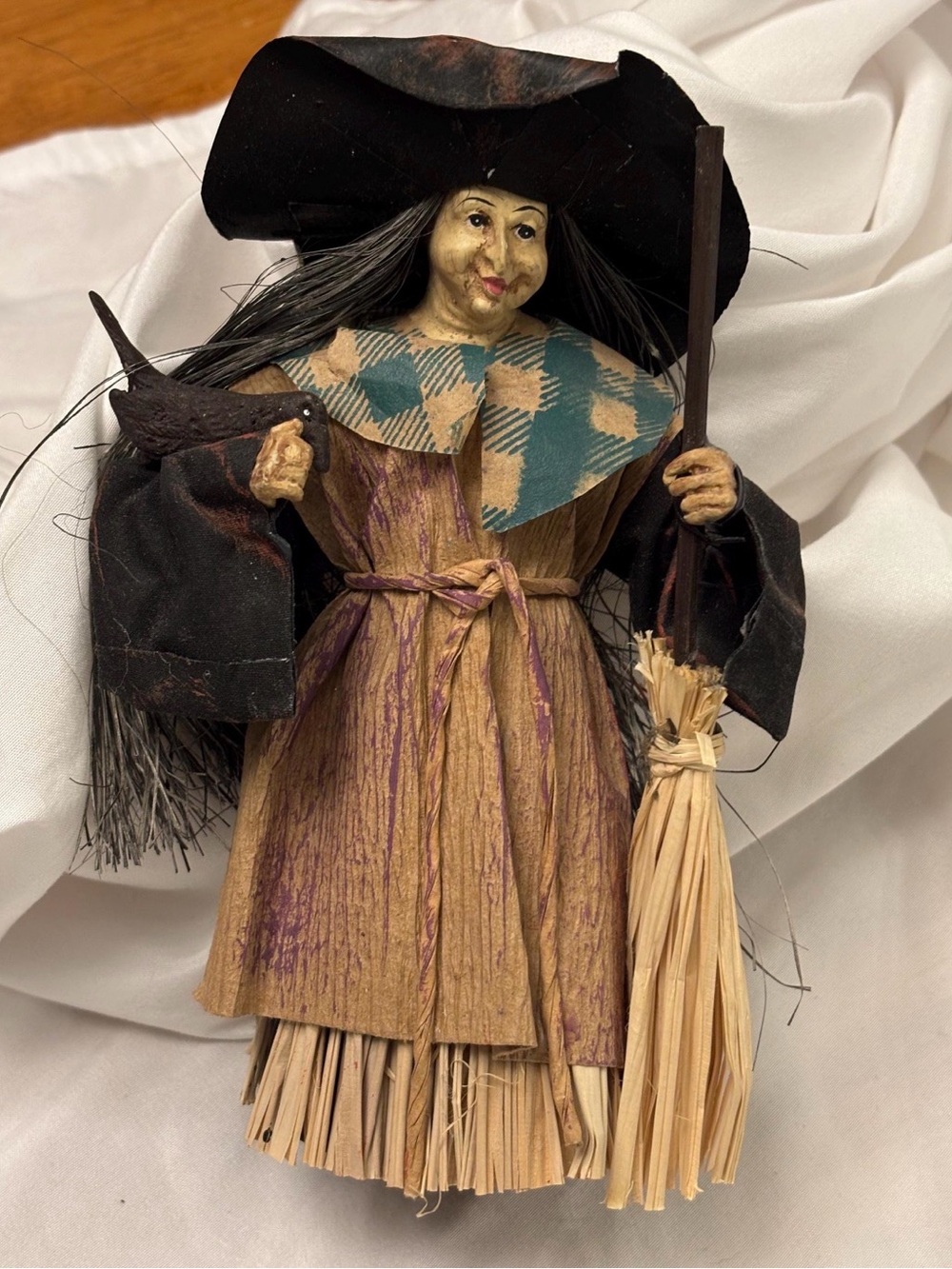 Vintage paper mache kitchen witch made in Philippines holding broom and Raven